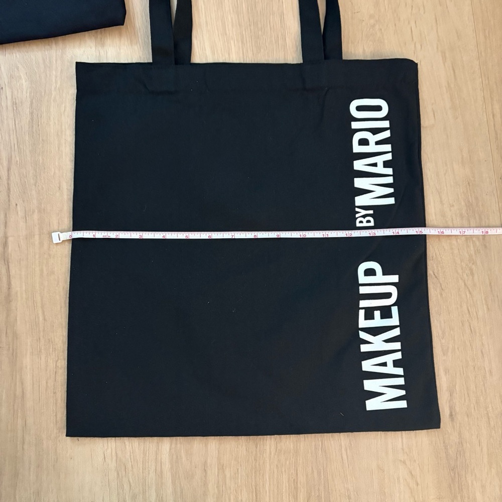 Makeup By Mario and Olaplex Black and white Tote Bag